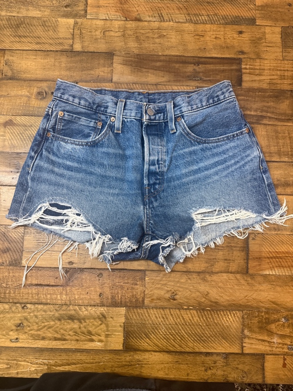 Levi's Faded Blue Distressed Cutoff Denim Shorts